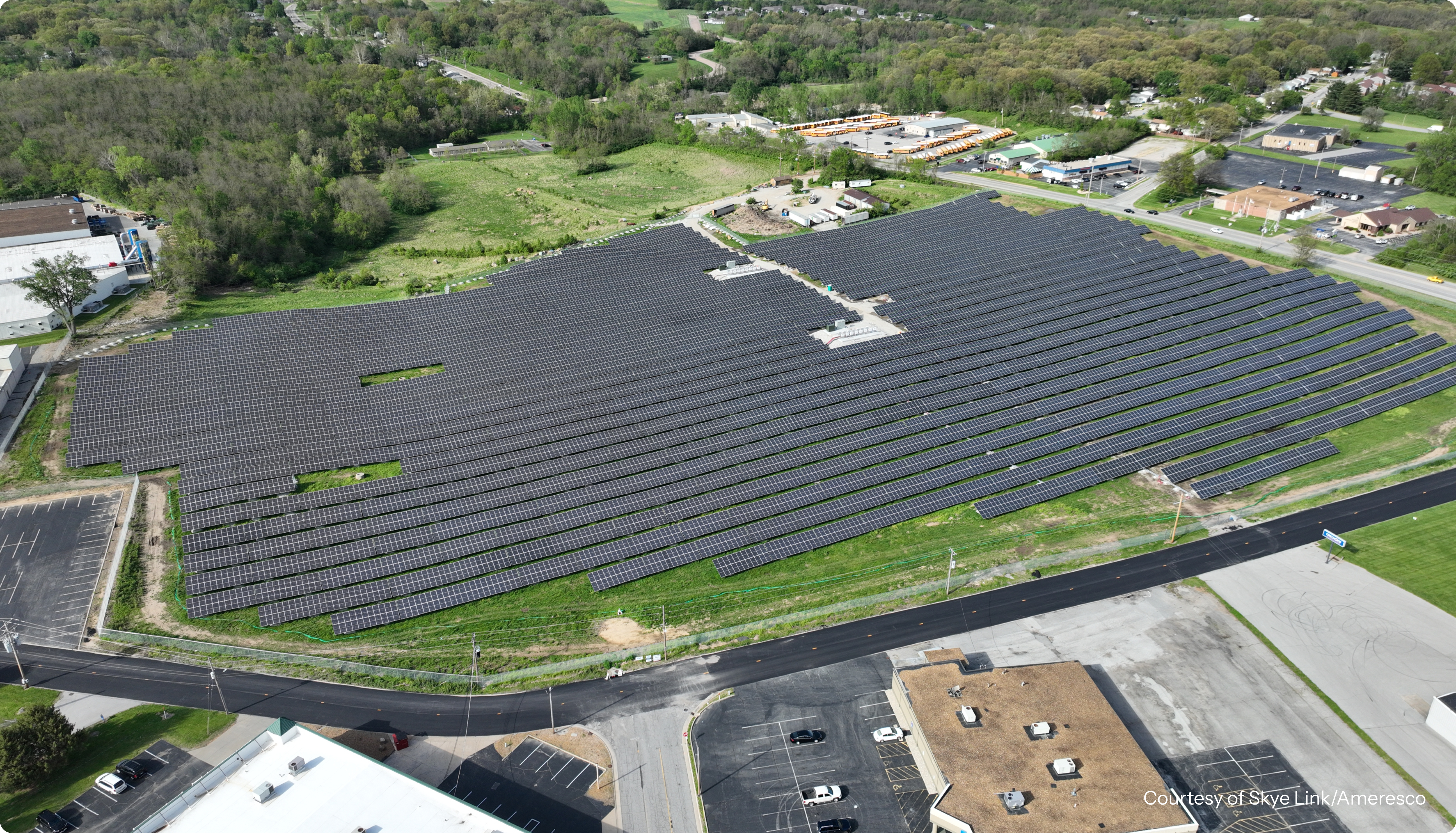 A large solar array nested between several roads